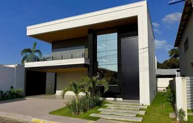 Imagem: A casa em condomínio possui 4 Dormitórios, 5 Banheiros, 4