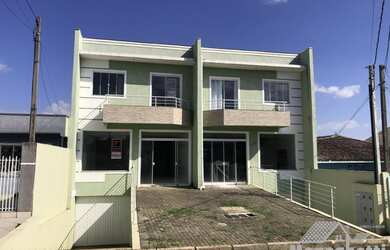 Imagem: A casa possui 2 Dormitórios, 4 Banheiros, 4 Vagas na garagem