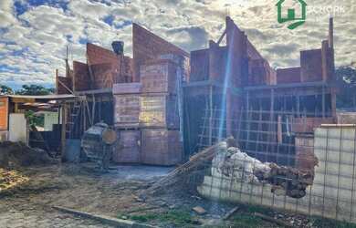 Imagem: A casa possui 2 Dormitórios, 3 Banheiros, 2 Vagas na garagem