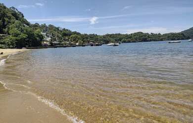 Imagem: A casa possui 2 Dormitórios e 1 Vaga na garagem e está localizado