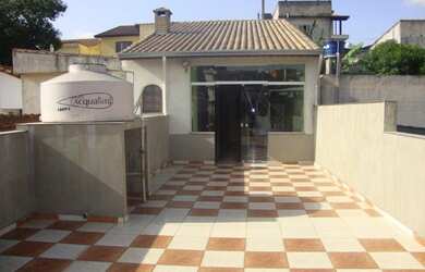 Imagem: A casa possui 3 Dormitórios, 4 Banheiros, 3 Vagas na garagem