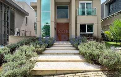 Imagem: A casa em condomínio possui 4 Dormitórios, 5 Banheiros, 5