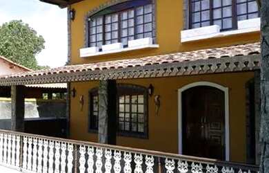 Imagem: A casa possui 5 Dormitórios, 5 Vagas na garagem e está localizado