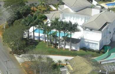 Imagem: A casa possui 5 Dormitórios, 3 Banheiros, 5 Vagas na garagem