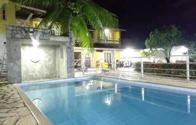 Imagem: A casa possui 5 Dormitórios, 5 Banheiros, 5 Vagas na garagem