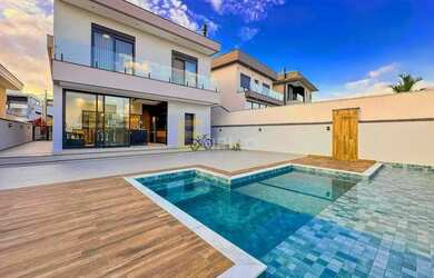 Imagem: A casa em condomínio possui 4 Dormitórios, 4 Banheiros, 4