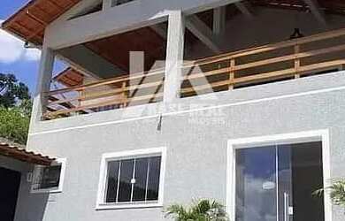 Imagem: A casa possui 3 Dormitórios, 3 Banheiros, 5 Vagas na garagem