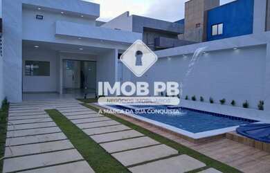 Imagem: A casa possui 3 Dormitórios, 5 Banheiros, 3 Vagas na garagem