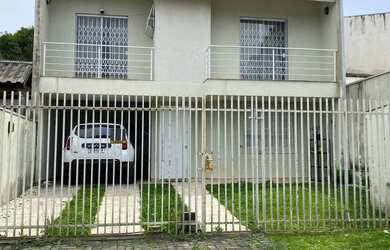 Imagem: A casa à venda possui 3 Dormitórios, 3 Banheiros, 2 Vagas