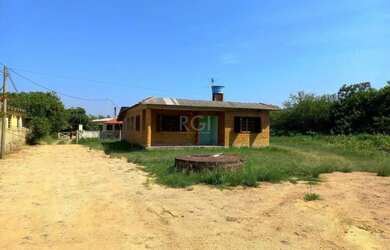 Imagem: A casa possui 3 Dormitórios, 1 Banheiro, 120m² de Área e