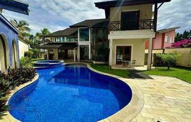 Imagem: A casa possui 5 Dormitórios, 5 Banheiros, 5 Vagas na garagem