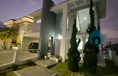 Imagem: A casa possui 3 Dormitórios, 3 Banheiros, 2 Vagas na garagem