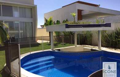 Imagem: A casa em condomínio possui 5 Dormitórios, 4 Banheiros, 4