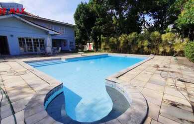 Imagem: A casa em condomínio possui 4 Dormitórios, 5 Banheiros, 5