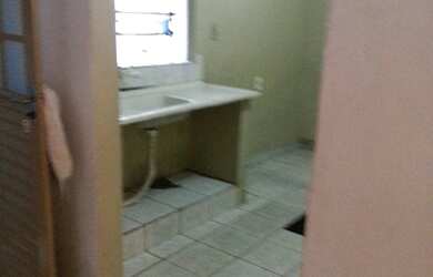 Imagem 12: Qnm 23 fundos 3qts 2 vagas água e luz e ent. separado 800,00 tratar,...