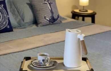 Imagem: A casa possui 3 Dormitórios, 2 Vagas na garagem e está localizado