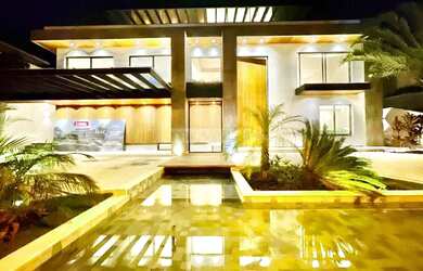 Imagem: A casa em condomínio possui 5 Dormitórios, 5 Banheiros, 4