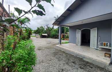 Imagem: A casa possui 2 Dormitórios, 1 Banheiro, 1 Vaga na garagem