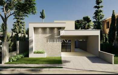 Imagem: A casa possui 3 Dormitórios, 2 Banheiros, 2 Vagas na garagem