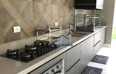 Imagem: A casa em condomínio possui 4 Dormitórios, 5 Banheiros, 5