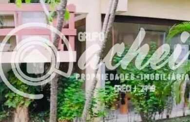 Imagem: A casa possui 3 Dormitórios, 3 Banheiros, 4 Vagas na garagem