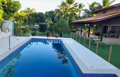 Imagem: A casa em condomínio possui 4 Dormitórios, 4 Banheiros, 5