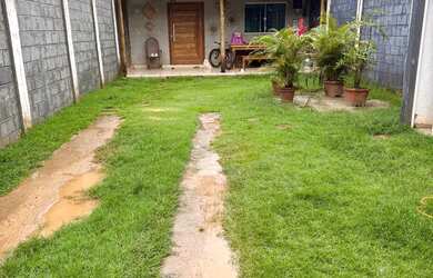 Imagem: A casa possui 2 Dormitórios, 2 Banheiros, 3 Vagas na garagem