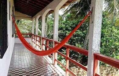 Imagem: A casa possui 4 Dormitórios, 3 Banheiros, 3 Vagas na garagem