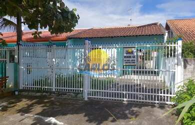 Imagem: A casa possui 2 Dormitórios, 1 Banheiro, 2 Vagas na garagem