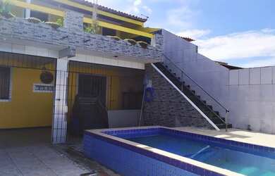 Imagem: A casa possui 4 Dormitórios, 1 Vaga na garagem e está localizado