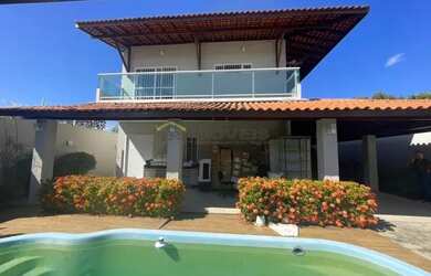 Imagem: A casa possui 4 Dormitórios, 4 Banheiros, 2 Vagas na garagem