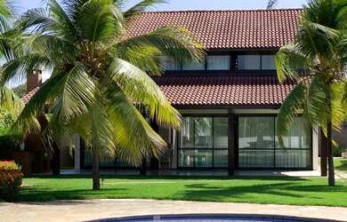 Imagem: A casa em condomínio e possui 5 Dormitórios, 5 Banheiros