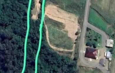 Imagem: O terreno possui 2500m² de Área e Imóvel novo e está localizado