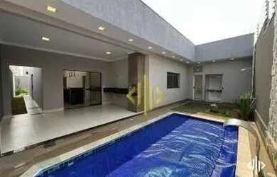 Imagem: A casa possui 3 Dormitórios, 3 Banheiros, 2 Vagas na garagem