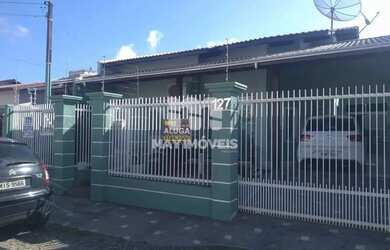 Imagem: A casa possui 2 Dormitórios, 1 Banheiro, 2 Vagas na garagem