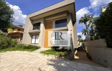 Imagem: A casa em condomínio possui 5 Dormitórios, 5 Banheiros, 5