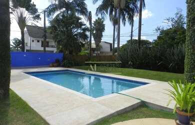 Imagem: A casa em condomínio possui 4 Dormitórios, 5 Banheiros, 4