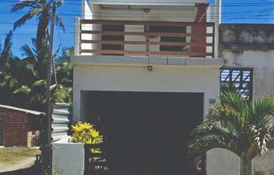 Imagem: A casa possui 2 Dormitórios, Acomodam 8 pessoas, 1 Vaga na