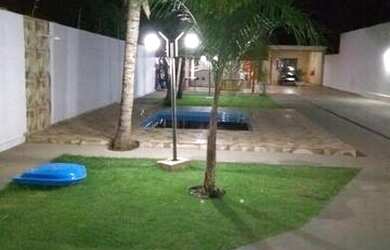 Imagem: A casa possui 3 Dormitórios, 5 Vagas na garagem e está localizado