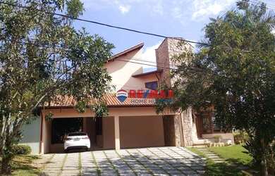 Imagem: A casa em condomínio possui 5 Dormitórios, 4 Banheiros, 4