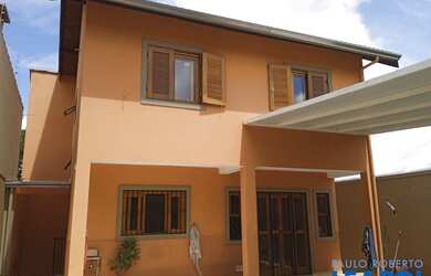 Imagem: A casa possui 3 Dormitórios, 4 Banheiros, 2 Vagas na garagem