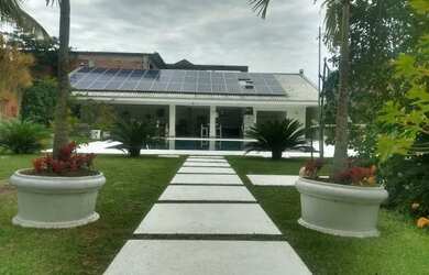 Imagem: A casa em condomínio possui 4 Dormitórios, 5 Banheiros, 3