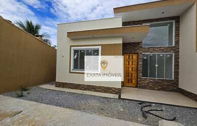 Imagem: A casa possui 3 Dormitórios, 2 Banheiros, 1 Vaga na garagem