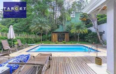 Imagem: A casa em condomínio possui 4 Dormitórios, 4 Banheiros, 4