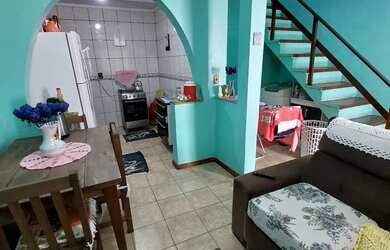 Imagem: A casa possui 2 Dormitórios, 2 Banheiros e está localizado