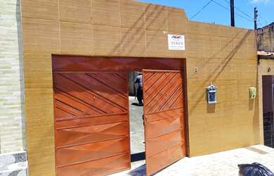 Imagem: A casa possui 2 Dormitórios, 2 Banheiros, 3 Vagas na garagem