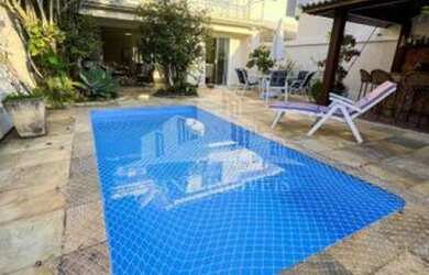 Imagem: A casa em condomínio possui 5 Dormitórios, 5 Banheiros, 4