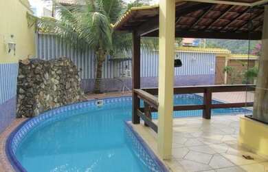 Imagem: A casa em condomínio possui 5 Dormitórios, 4 Banheiros, 3