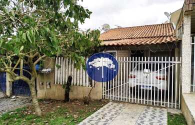 Imagem: A casa possui 2 Dormitórios, 1 Banheiro, 1 Vaga na garagem