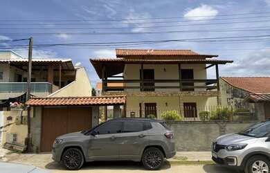 Imagem: A casa possui 3 Dormitórios, 4 Banheiros, 5 Vagas na garagem